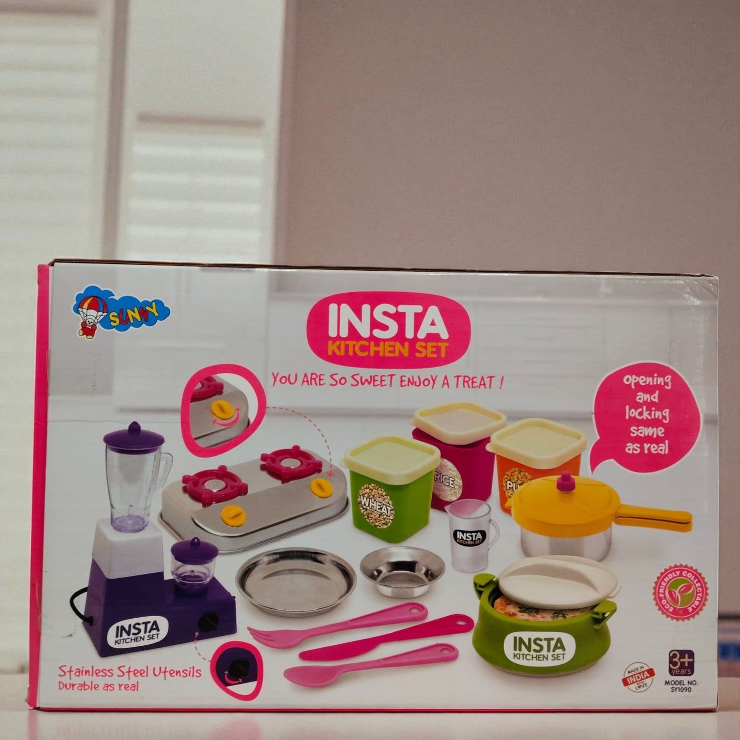 Back of Insta Kitchen Set toy box showing all included kitchen accessories in colorful illustration