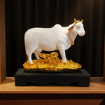 Front view of Kamdhenu Cow and Calf Showpiece in golden base