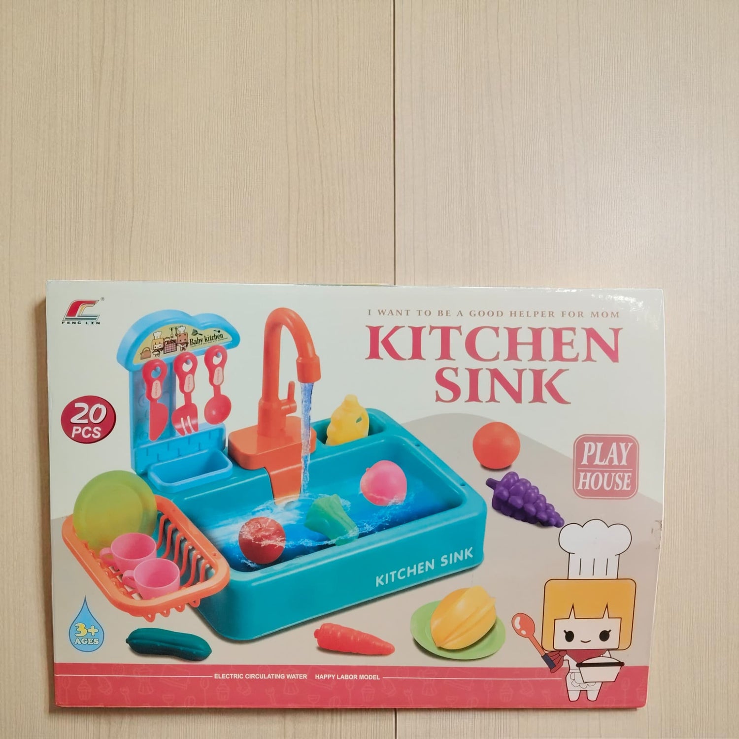 Play House kitchen sink toy set box showing colorful sink, utensils, and accessories