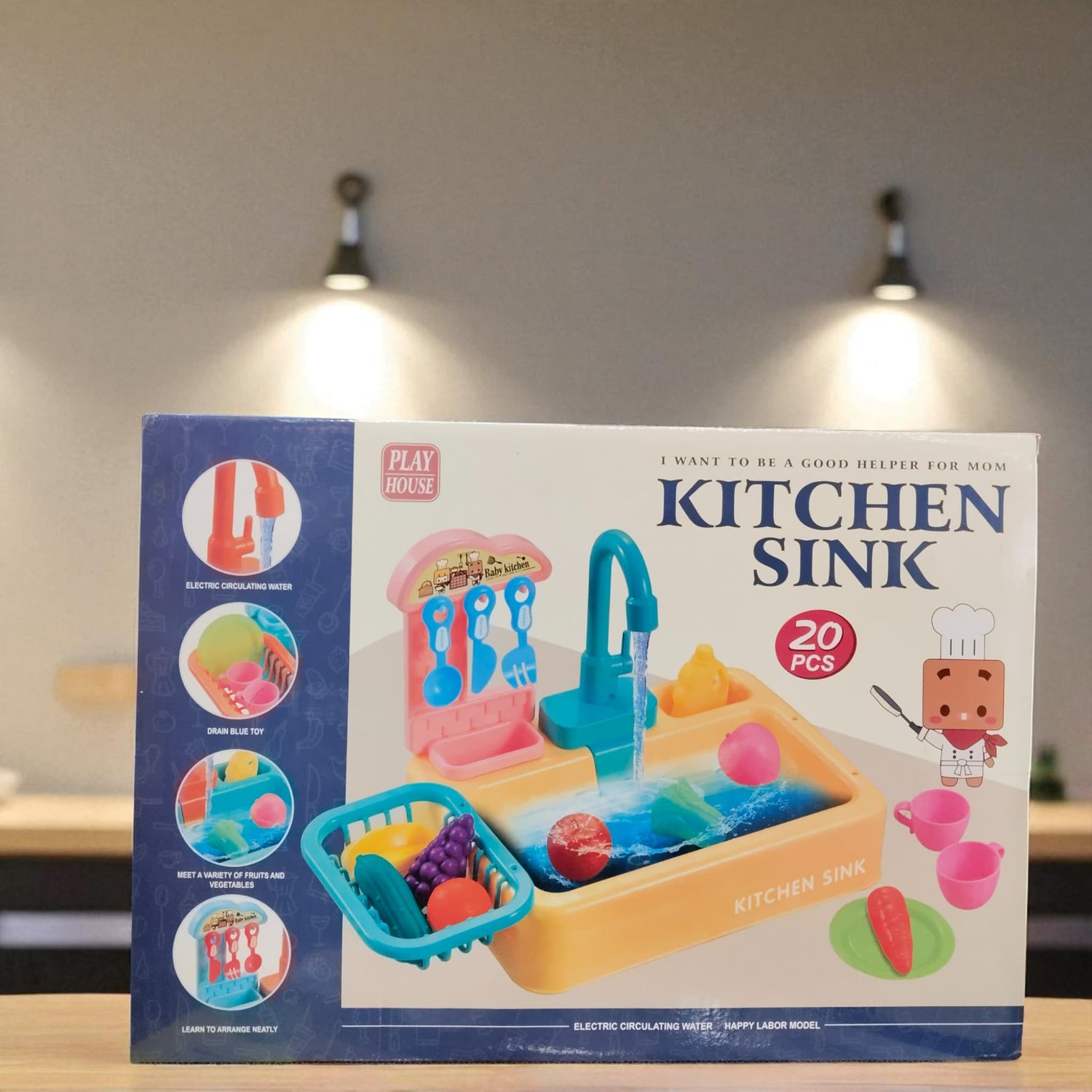 Front view of kitchen sink toy set with 20 pieces including fruits and utensils