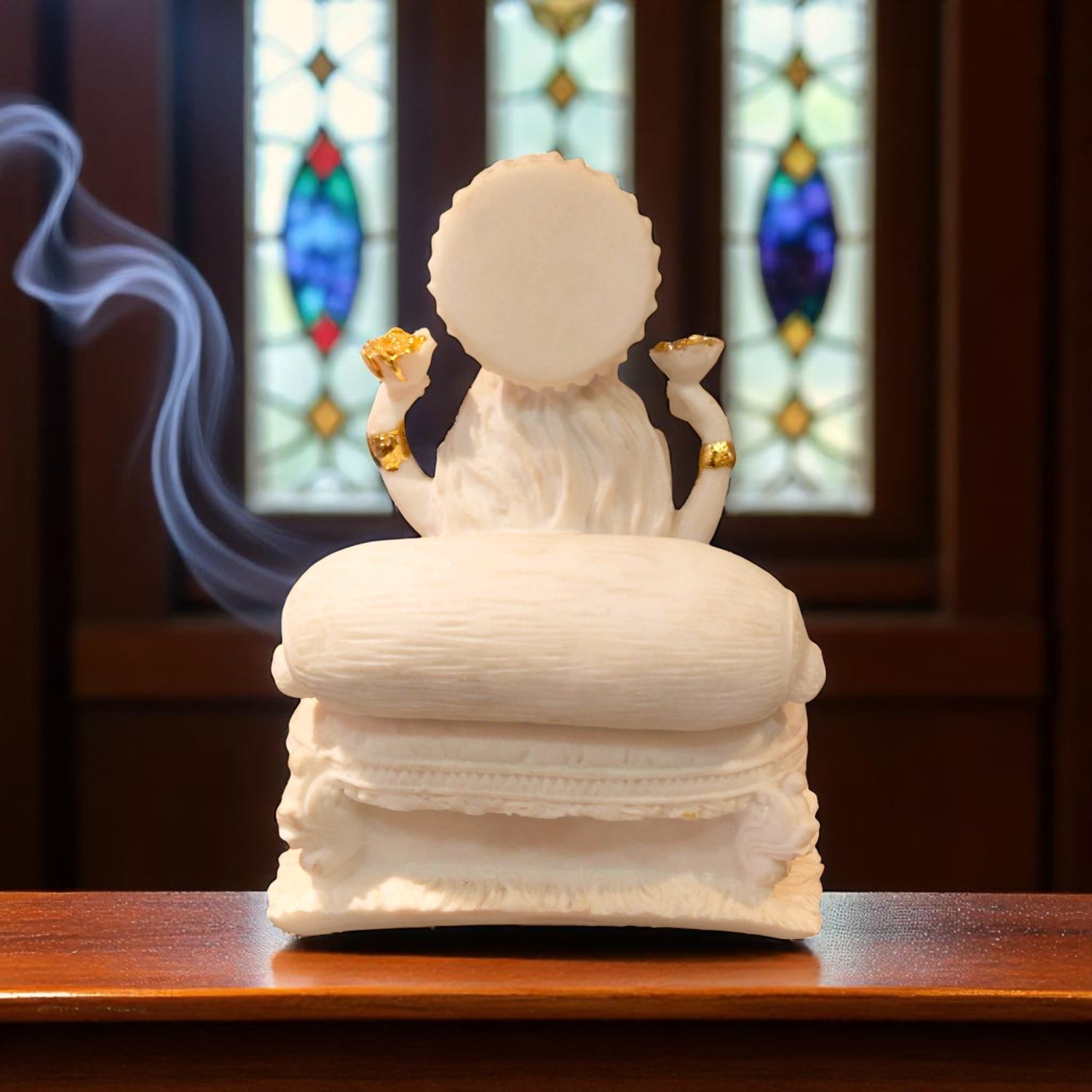 Back view of White and Gold Lakshmi Idol seated on throne