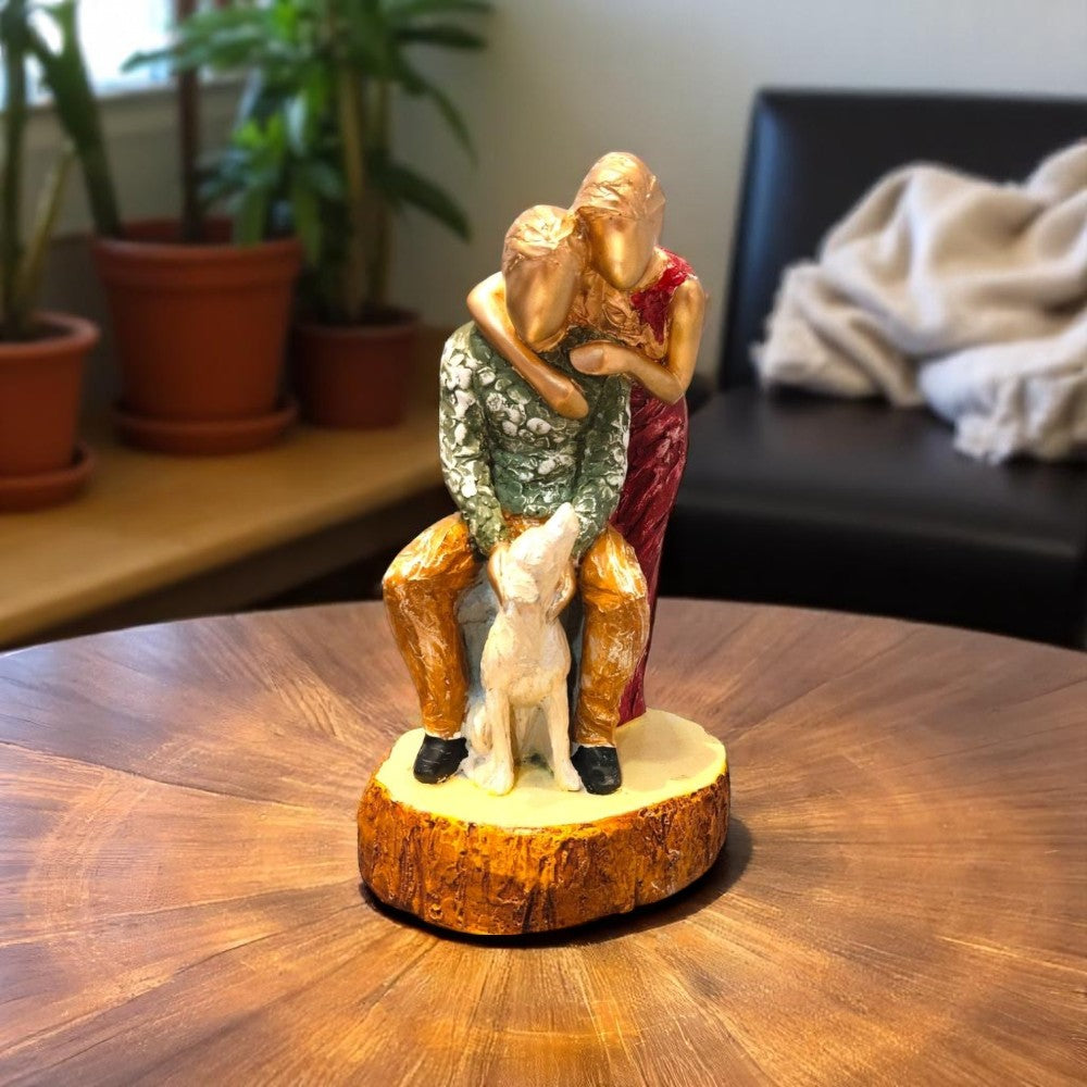 Couple sculpture with dog sitting on natural wooden base – emotional art showpiece