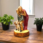 Side pose of emotional couple with dog – made in India decor