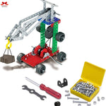 Mechanical model kit with tools and parts on a white background