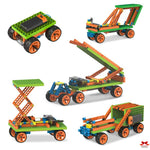 Set of colorful toy construction vehicles on a white background