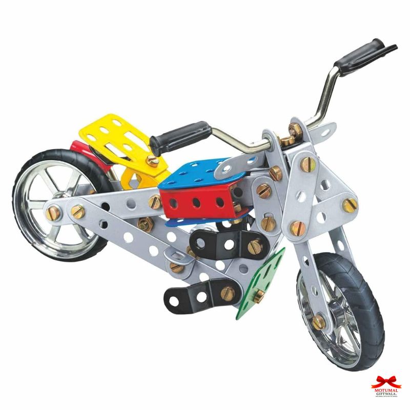 Model motorcycle kit with colorful components on a white background