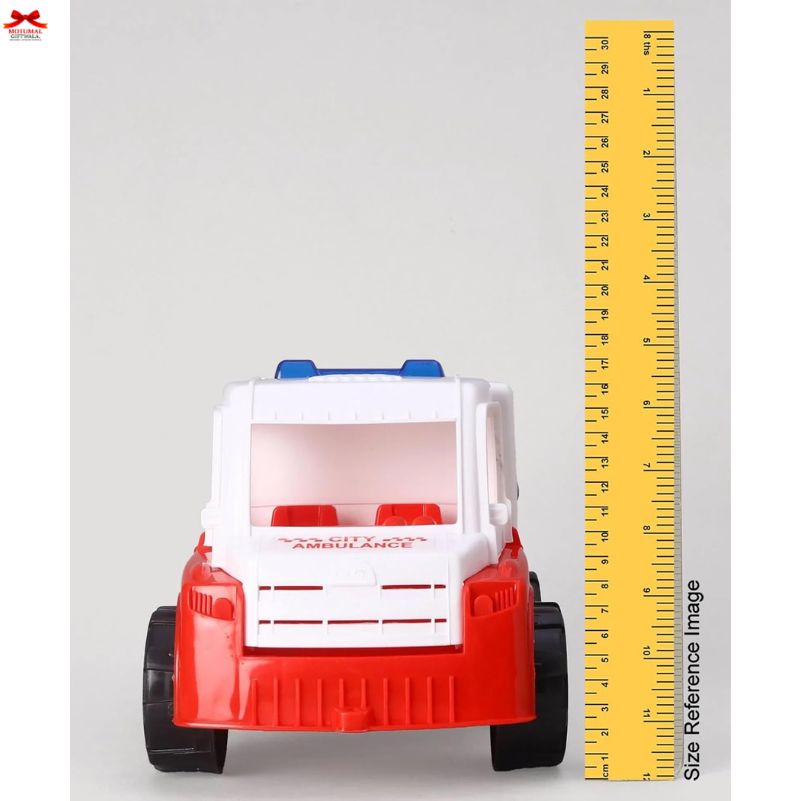 Toy ambulance with a ruler for size reference on a gray background
