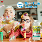 Two children blowing bubbles with a bottle of Party Bubbles non-toxic solution on a table.