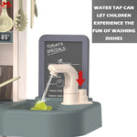 Children's water tap with a sink and chalkboard in the background