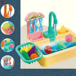 Toy kitchen sink set with running water, toys, and accessories on a blue background.