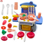 Toy kitchen set with various utensils and food items on a white background