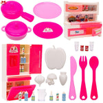 Collection of pink toy kitchen items including pots, pans, utensils, and a refrigerator.