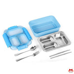 Blue bento box with compartments, silver fork and spoon, and additional stainless steel container on a white background.