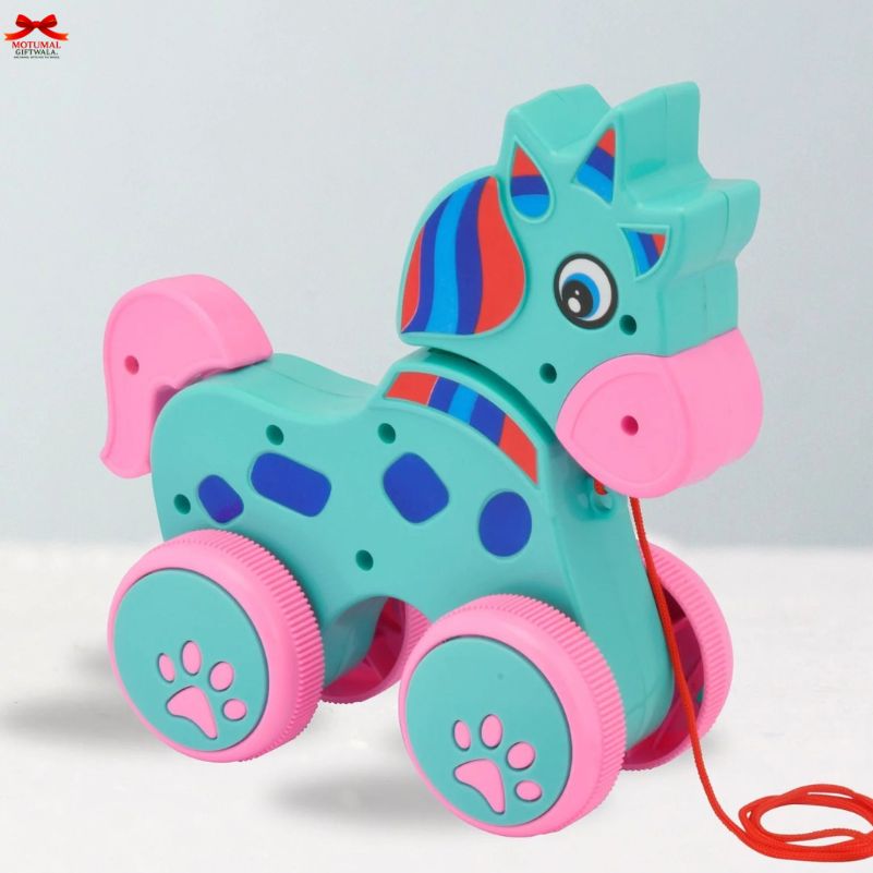 Colorful toy horse with pink wheels and a red string on a white background
