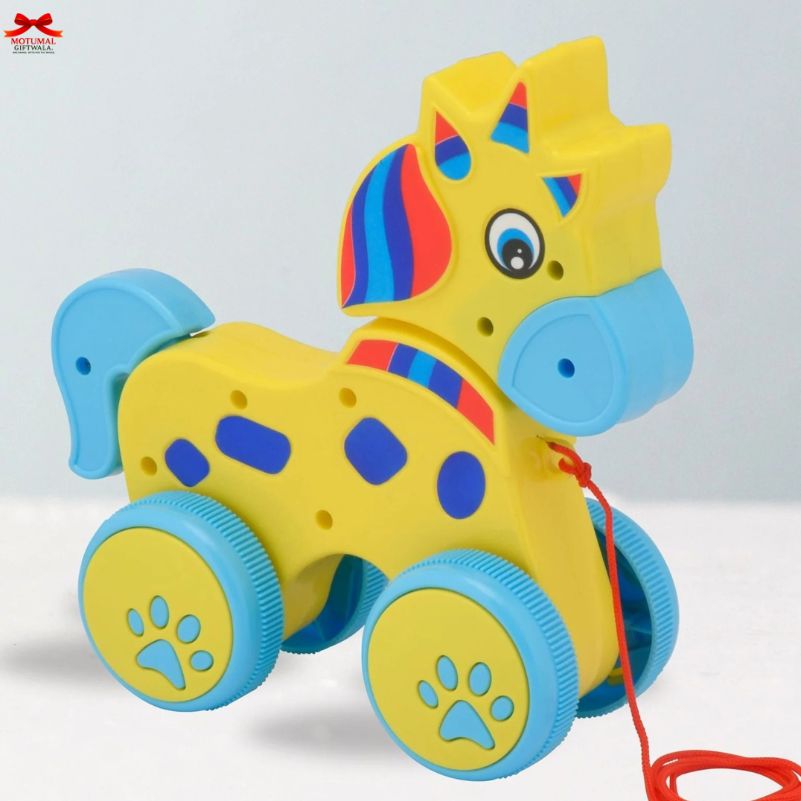 Colorful toy horse with a rainbow mane on a white background