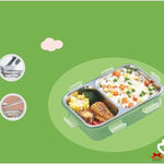 Bento box with food on a green background