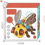 Toy bee figure with colorful lights on a box, dimensions indicated.