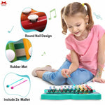Child playing with a colorful xylophone toy, with close-up details of the round nail design and rubber mat.