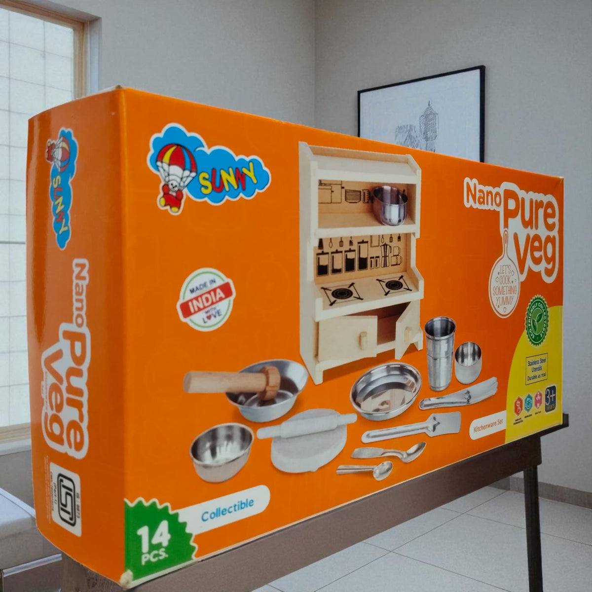 Nano Pure Veg Kitchen Set box showing angled side with utensils and kitchen setup.