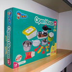 Side angled shot of Open House Kitchen Set toy box highlighting accessories and branding.