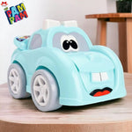 Toy car with a face on a wooden surface, featuring the brand 'Pam Pam'.