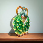 Side angle of colorful peacock couple showpiece"