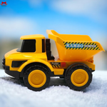 Toy dump truck with 'RAMBO DUMPER' branding on a snowy background