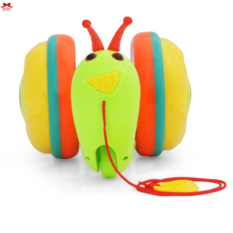 Colorful toy caterpillar with a red string on a white background