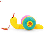 Colorful toy snail with a red antenna on a white background