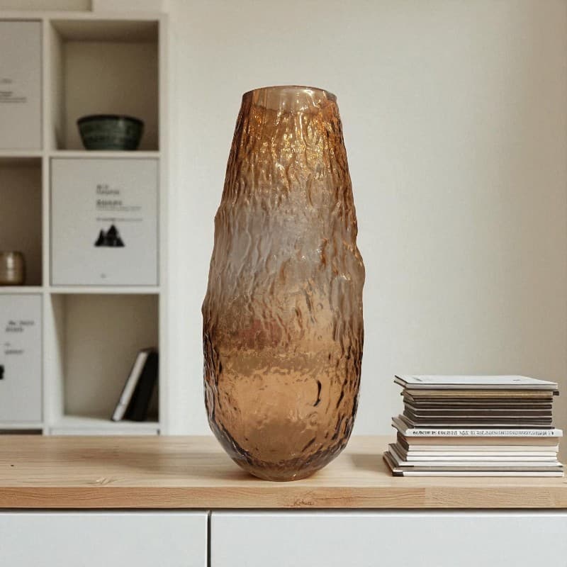 Brown textured vase on a wooden surface with a blurred background