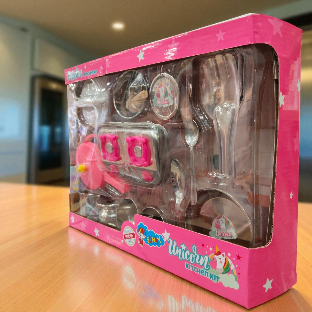 Side view of Sunny Unicorn Kitchen Kit box showing utensils and accessories for kids.