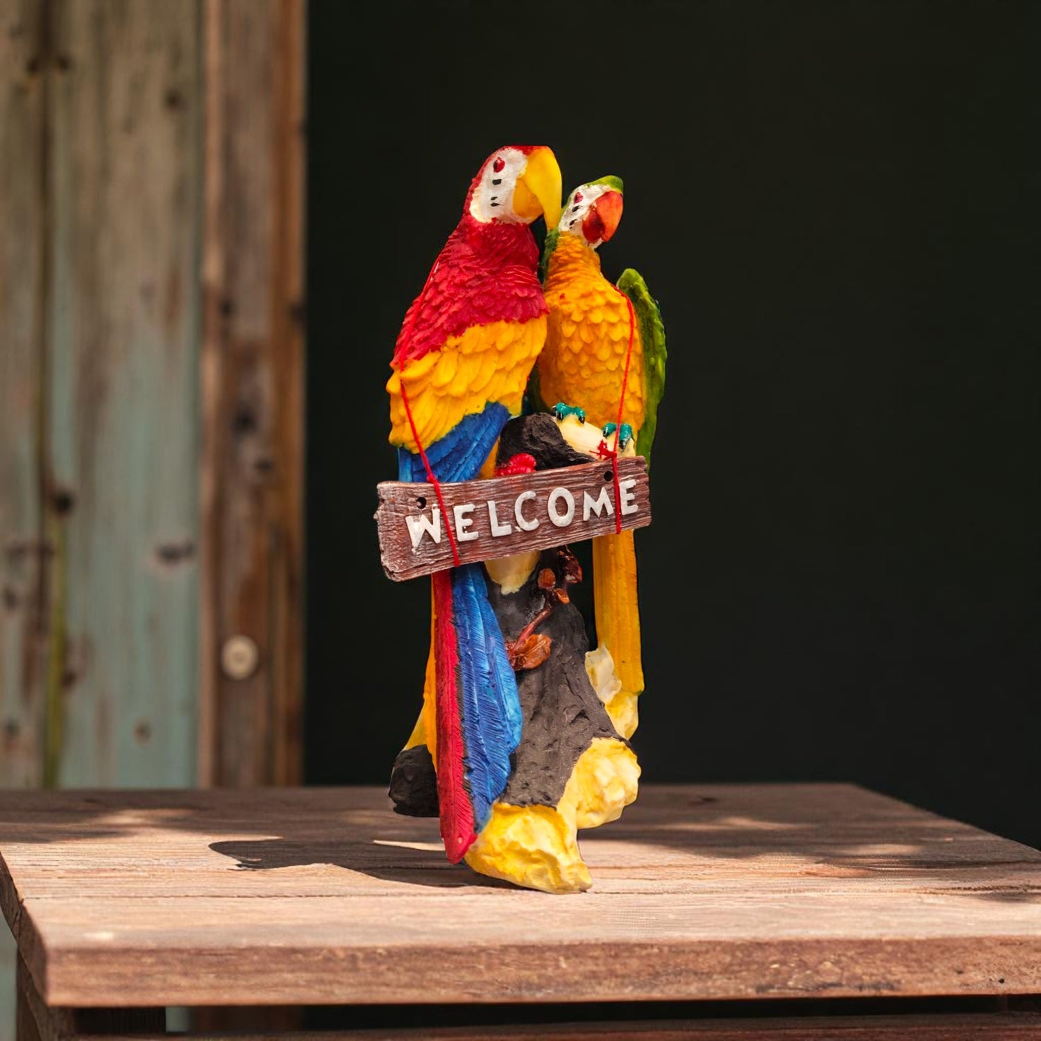  Diagonal view of parrot pair holding welcome board – handmade decor